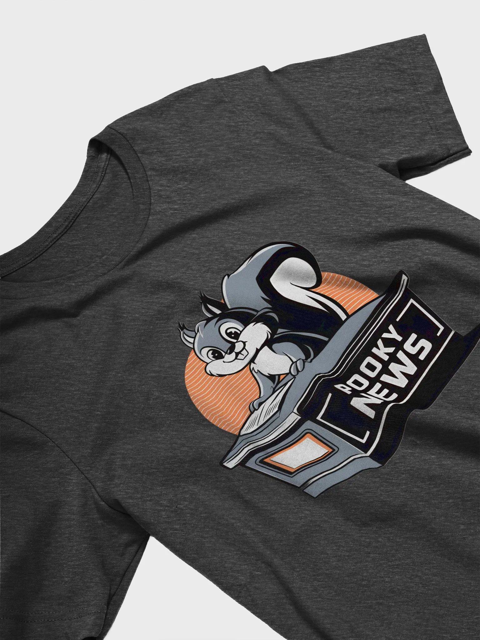 Super Soft and Flattering Tee: Pooky News, Grey Desk with orange product image (3)