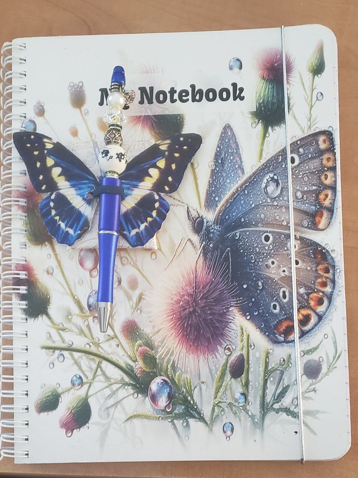 Whimsical Butterfly with Droplets Coiled My Notebook product image (1)