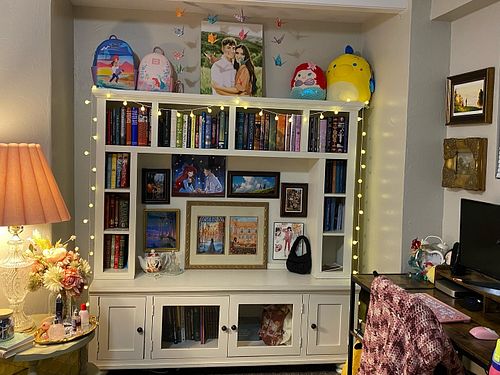 We moved again! Check out the new book corner 🫶🏼💓 
(Also yes that is me dressed up as Dracula for Halloween)
