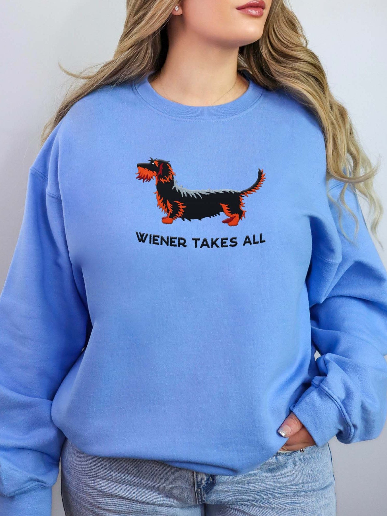 Wiener Takes All Sweatshirt (Embroidered) of a Wirehaired Dachshund(Black & Tan) product image (2)