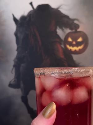 Looking for a bloody good #Halloween cocktail? Make The Headless Horseman! 🖤🎃 Hope y’all have a sense of humor because I left a blooper in this otherwise perfect ASMR cocktail video. 🤣 The Headless Horseman 1/4 cup pomegranate juice 2 oz spiced rum 1 Tbsp simple syrup 1 dash ground cinnamon @Reed’s Ginger Beer  for topping 1) If desired, make a cinnamon sugar rim for your glass by running a lemon slice around the edge then dipping the glass in cinnamon sugar. 2) Pour pomegranate juice, spiced rum, simple syrup, and a pinch of cinnamon in a cocktail shaker filled with ice. Shake well and strain into glass filled with ice. Top with ginger beer. #halloweencocktail #cocktails #headlesshorseman #sleepyhollow 
