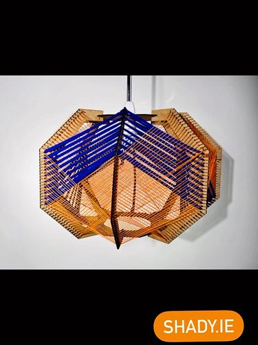 This is our larger geometric shaped woven lamp in Orange and popping Blue. This lamp is approx 50cm wide by 30cm high. It can...