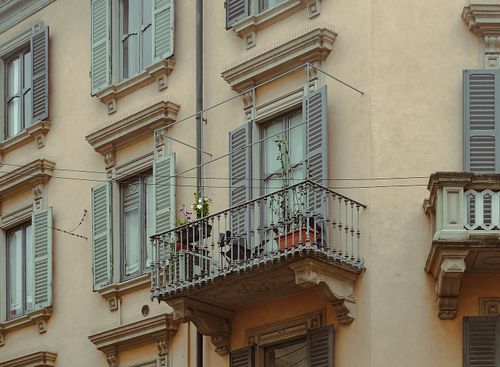 A charming European balcony, a place where time slows down and beauty finds its way into everyday life. 🏡 This photograph is ...