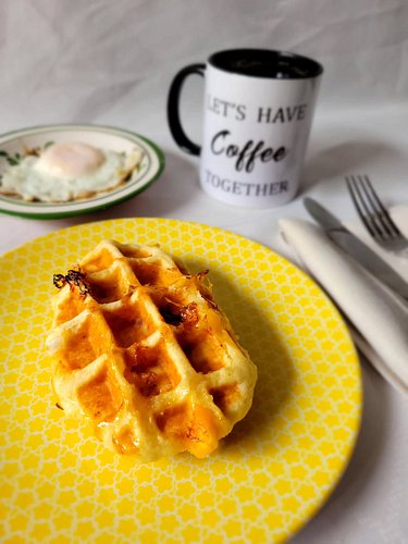 What better way to start your day than with a sweet and savory treat? Our Ham & Cheese waffle is just what you need in the mo...