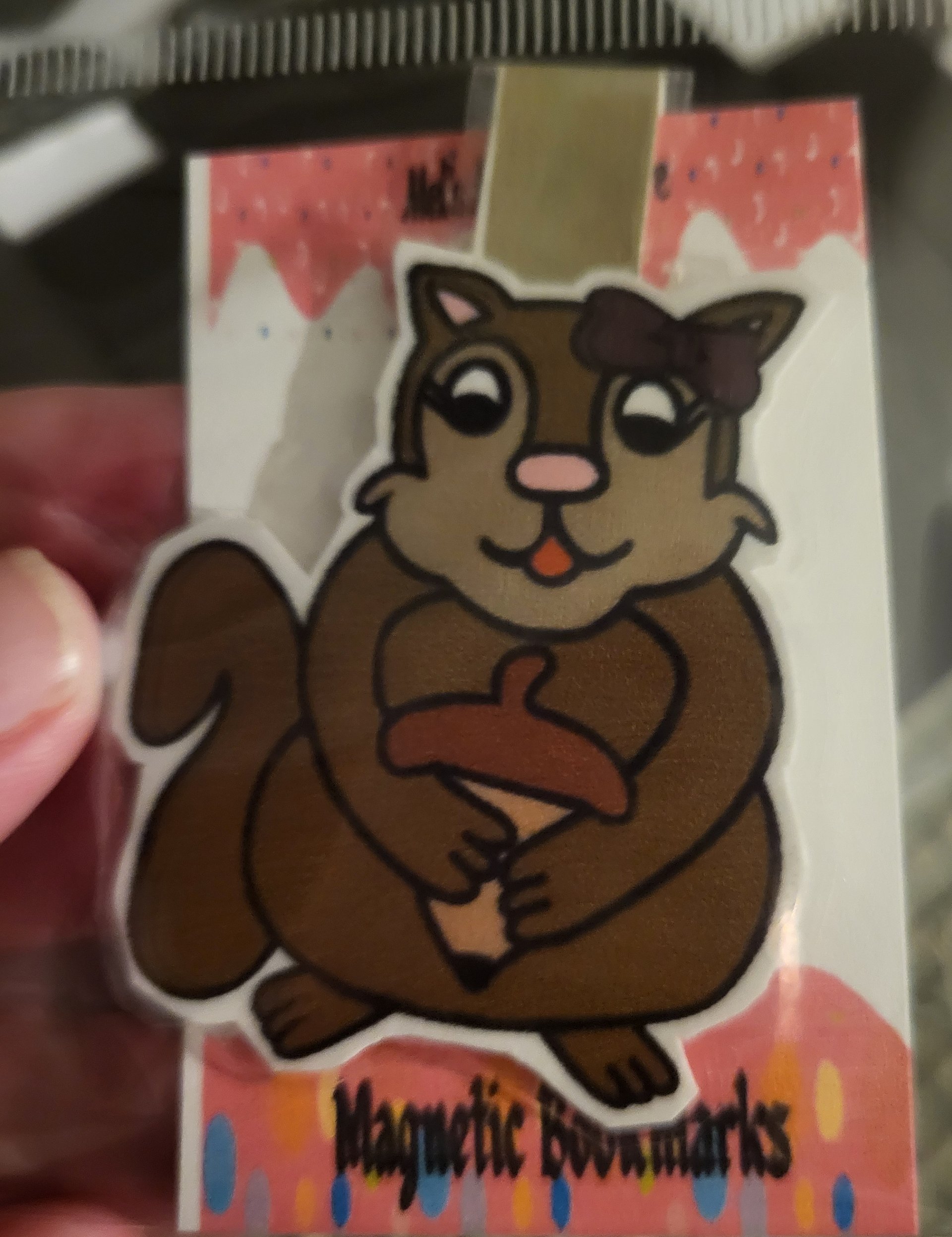 Cute Cartoon Girl Squirrel with a Bow Holding a Giant Acorn Laminated Magnetic Bookmark product image (1)