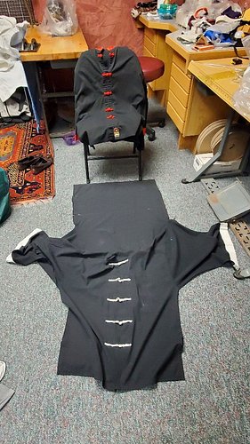 Added a hood to this well loved kung fu top. It's actually a Changshan (long shirt) so historically it was likely used for mu...