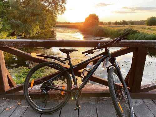 Evening bike ride in the countryside. Gorgeous sunset and perfect weather included. 
#bike #sunset #dusk #river #village