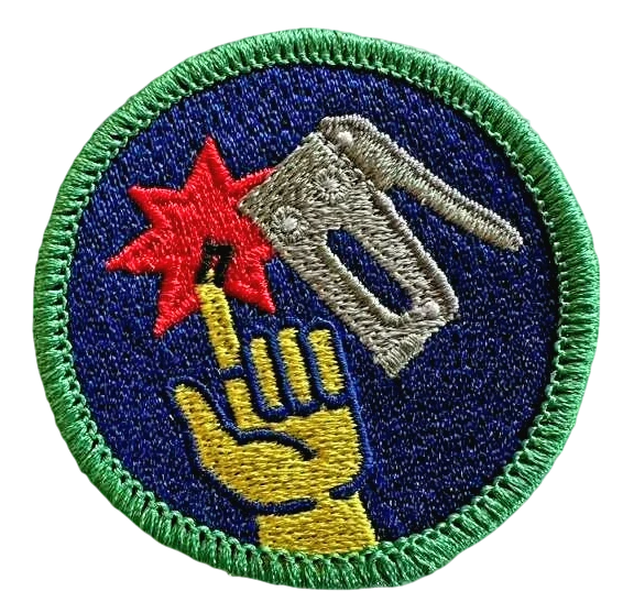 Staple Gun Mishap (de)Merit Badge product image (1)
