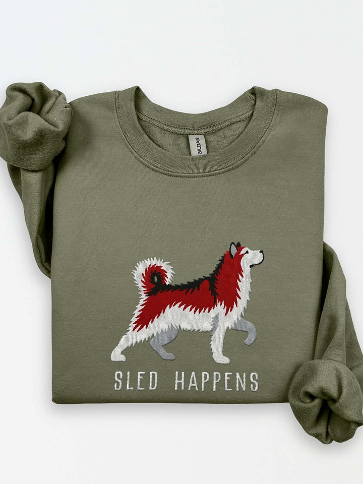 Sled Happens Sweatshirt (Embroidered) of an Alaskan Malamute(Red & White) product image (1)