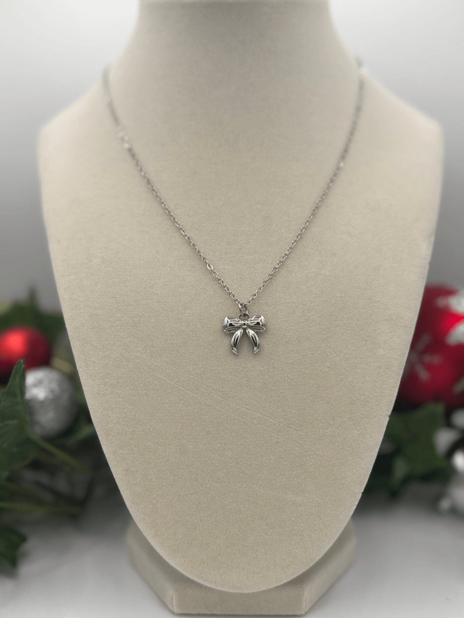Christmas Bow Necklace (Silver and Gold) product image (1)