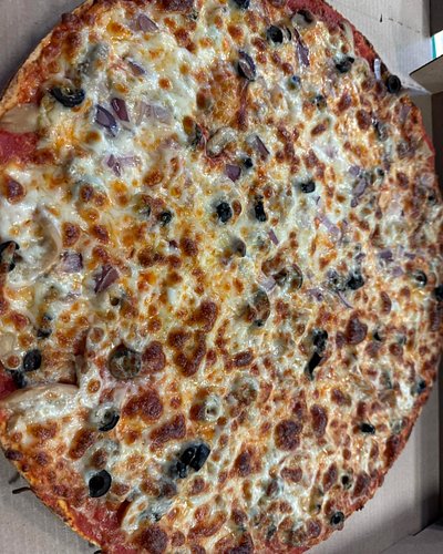 Some pizzas from the day. An XL meats with and without hot honey drizzle. A cauliflower crust cheesy bread, and put some bone...