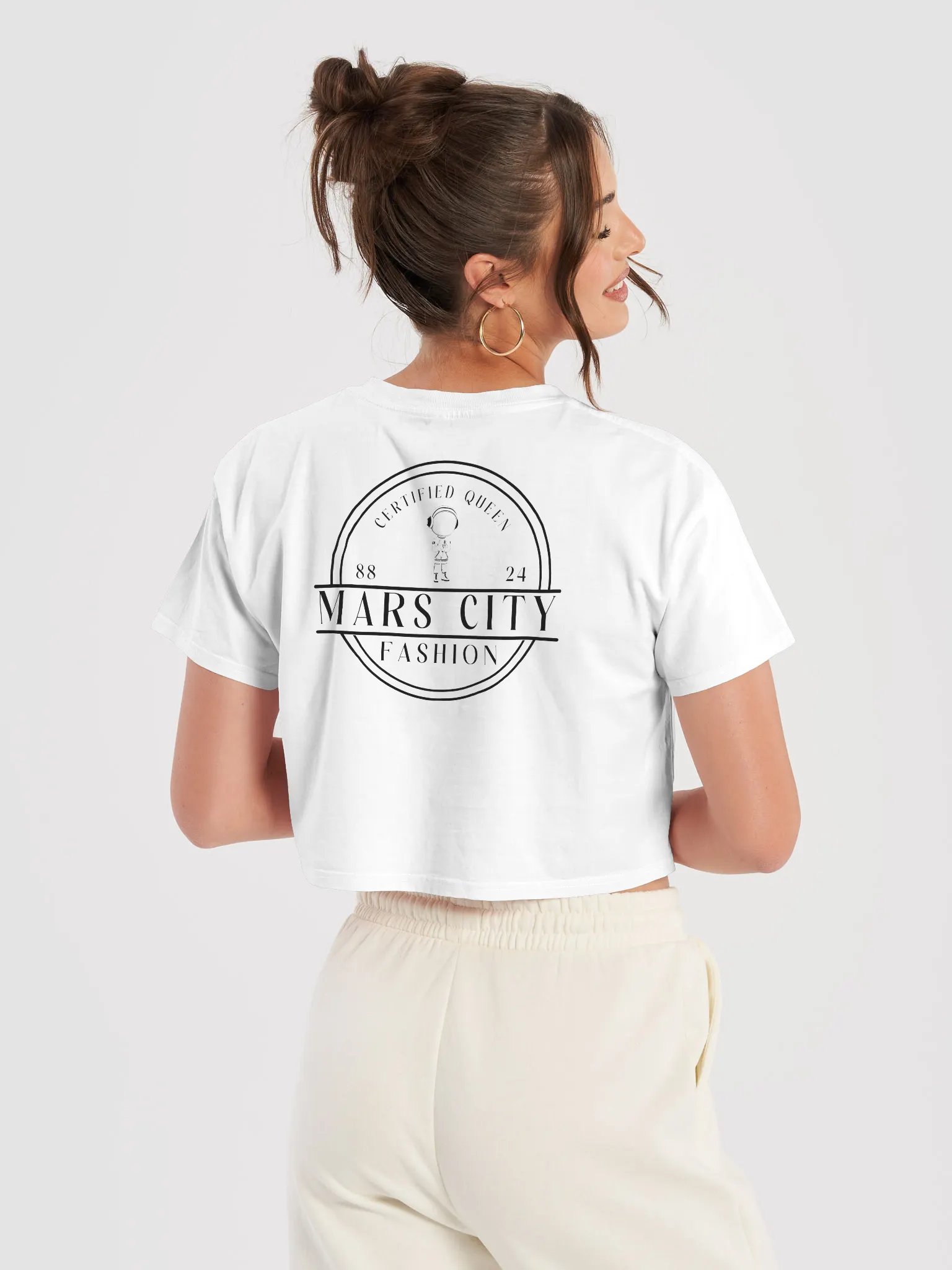 Ladies white cropped tee shirt with Gold Astronaut black circle front product image (7)
