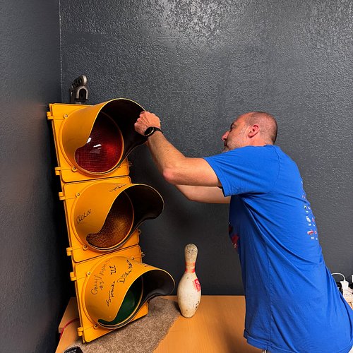 Our friend Joel Miller joined us in studio last night for an episode recording, so he got to sign the traffic light
