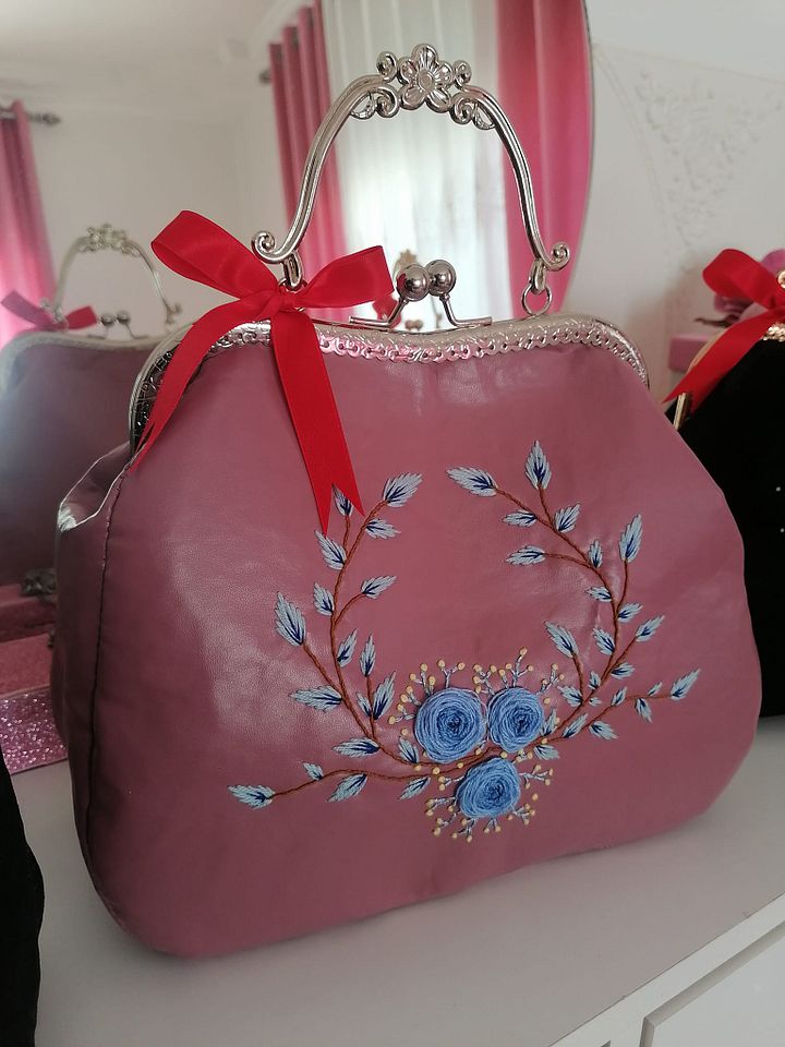 Pink leather handbag product image (1)