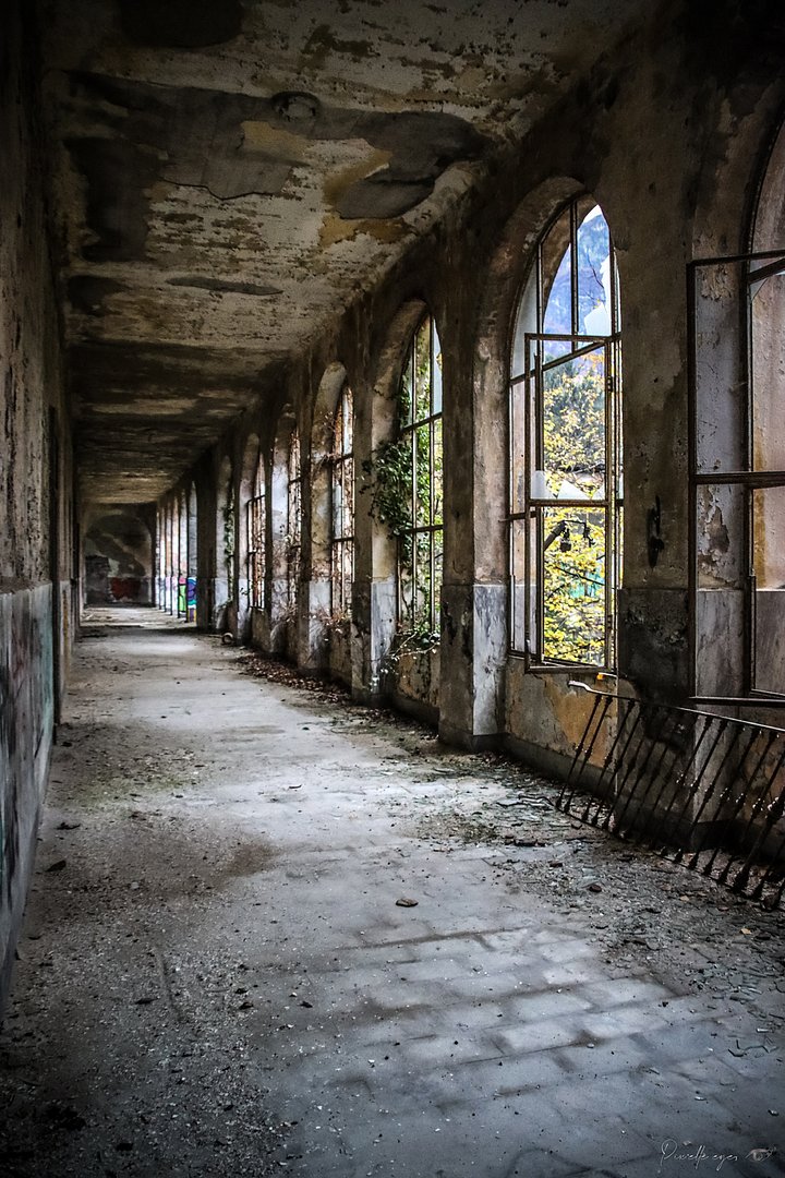 The Silent Corridor – Abandoned Arched Hallway product image (1)