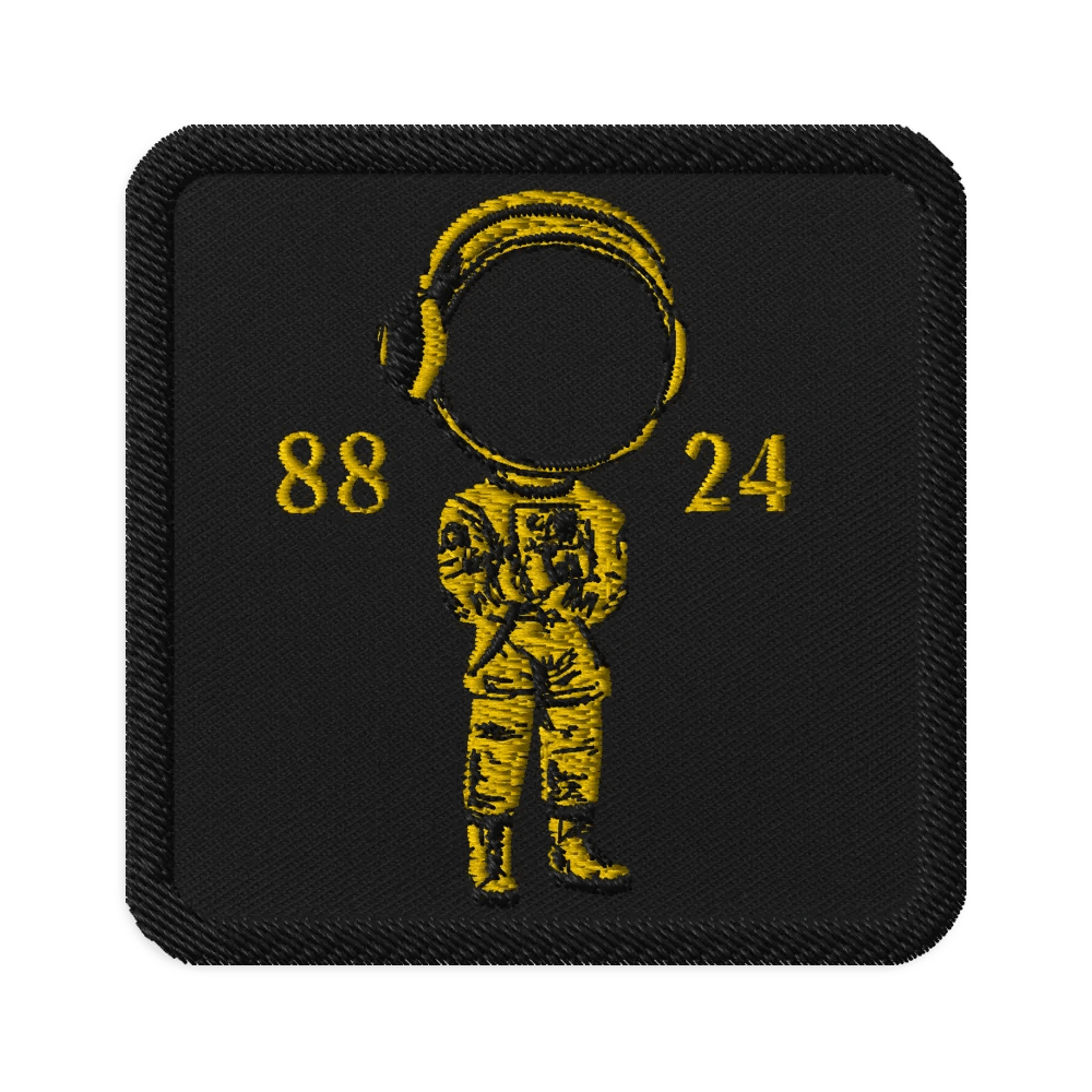 ALL GOLD ASTRONAUT PATCH WITH BLACK BACKGROUND SQUARE product image (1)