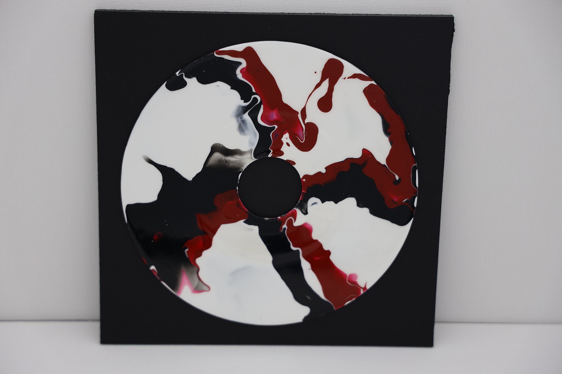 Framed Acrylic Pour Painting on 45 Vinyl Record - Red and Black product image (1)