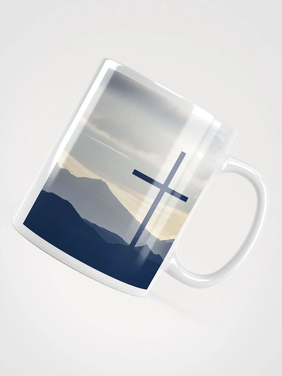 A cross standing against a serene landscape of rolling hills & a Radiant cross illuminated by a bright, golden light with glowing sunrise & doves Mug product image (4)