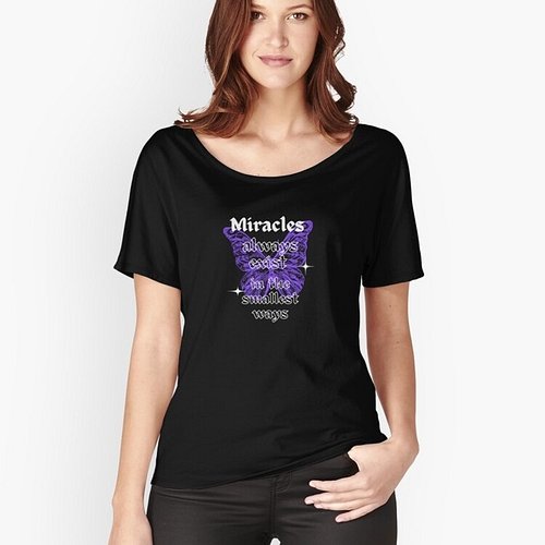Subtle Wonders Relaxed Fit T-Shirt The theme of the image appears to be inspirational, emphasizing that miracles can be found...