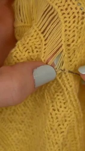 Re-knitting a run in a damaged knit blanket. This was one of many repairs done on a special knit blanket I worked on recently...