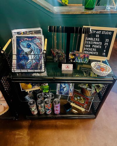 Willis the Shark just swam into The Ground Coffee House & Plant Shop! Come say hi, sip something good, and snag a print while...