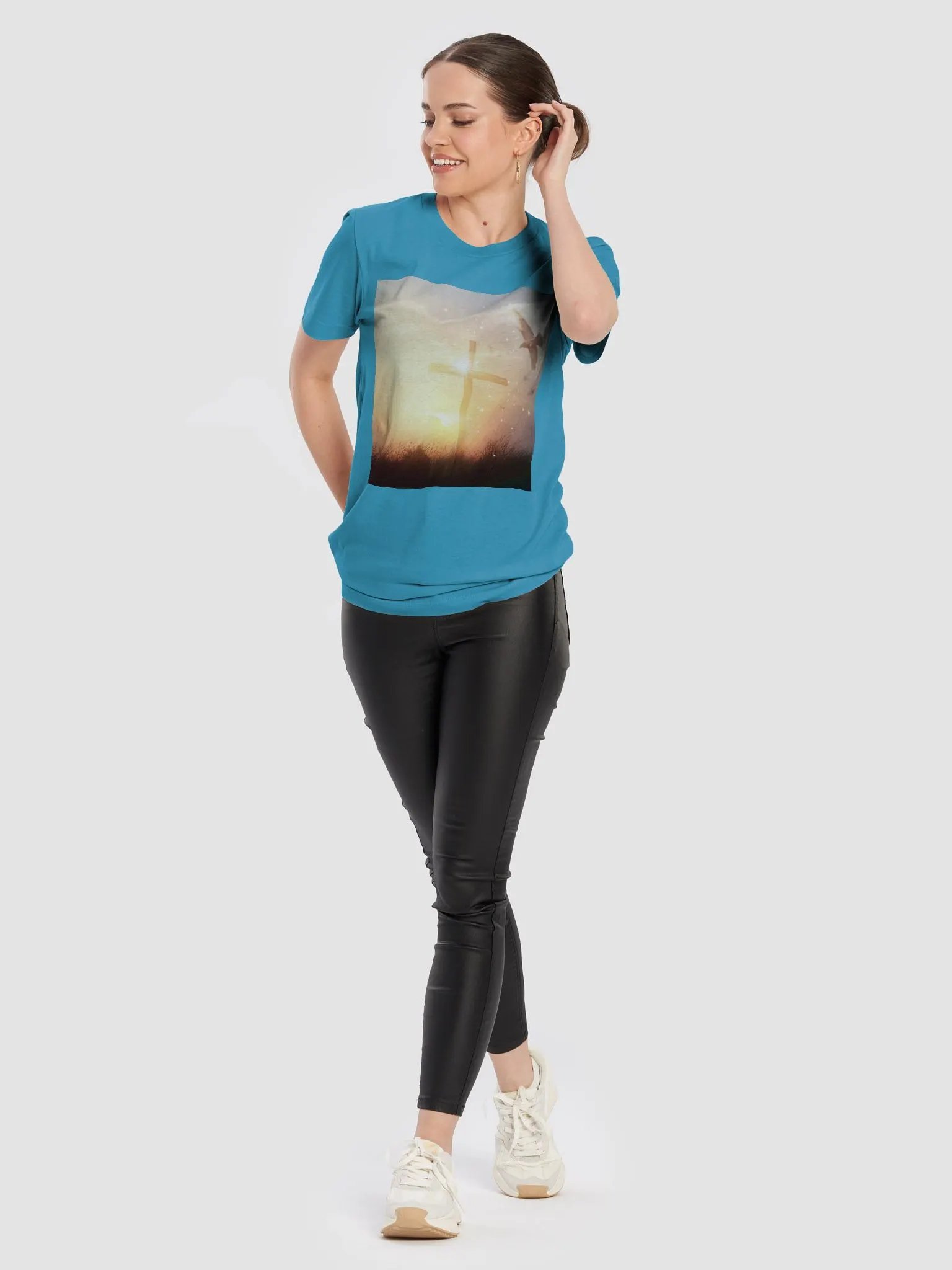 Radiant cross illuminated by a bright, golden light, set against a soft & glowing sunrise background & doves t-shirt product image (6)