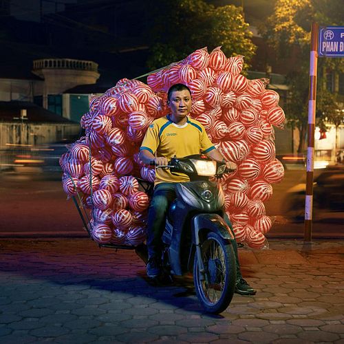 Every day in the vibrant city of Hanoi, captivating scenes play out as skilled delivery drivers effortlessly weave through th...