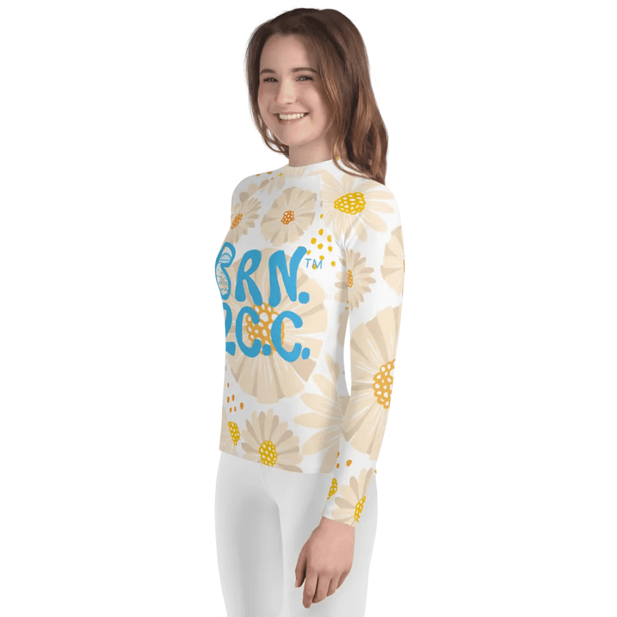 Girls' | YOUTH | Rash Guard | BRN.2C.C.™ Front Graphic | BOURNE to Cape Cod™ Sleeve & Back Logo | Coastal Swim Shirt for Kids | UV Protection Activewear | Blue Logo | Daisy Pattern product image (3)
