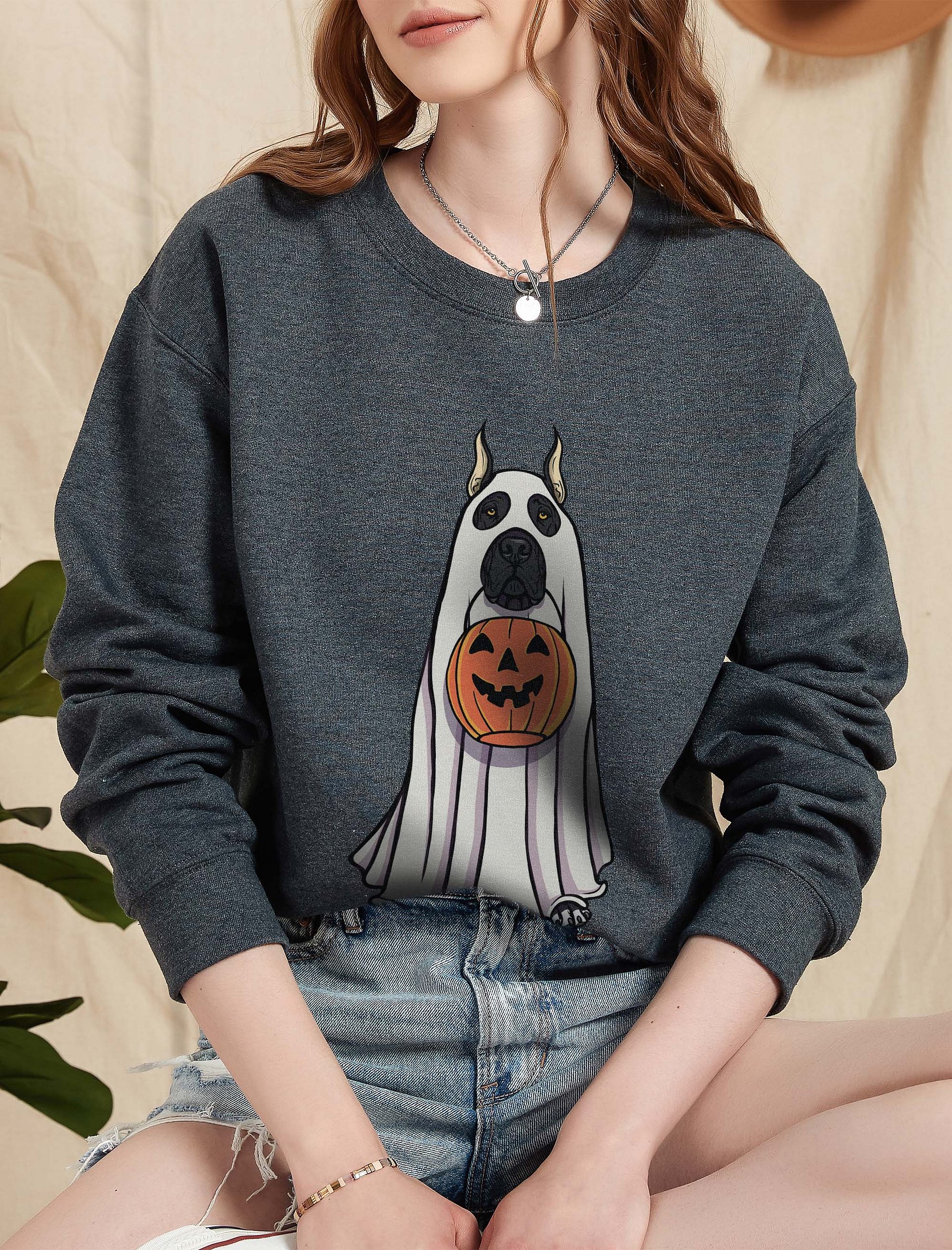 Funny Halloween Great Dane(Cropped Ears Black) Sweatshirt | Funny Great Dane Wearing a Ghost Costume and Holding a Pumpkin Basket product image (1)