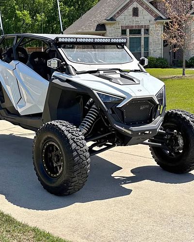 It's hard to make a four-seater look good, but the owner of this 2022 Polaris RZR XP 4 1000 Sport NAILED IT. The High Lifter ...