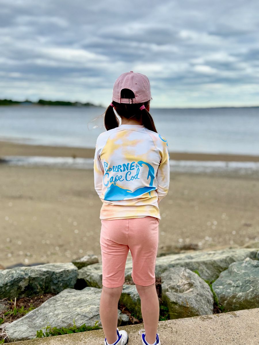 YOUTH | Rash Guard | BRN.2C.C.™ Front Graphic | BOURNE to Cape Cod™ Sleeve & Back Logo | Coastal Swim Shirt for Kids | UV Protection Activewear | Blue Logo on Orange Tie-Dye product image (7)