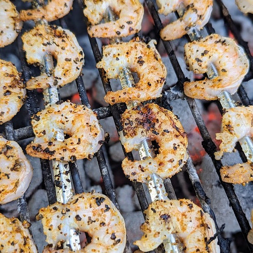 Shrimp over charcoal, seasoned with @unclestevesshake Lucky Shake! #shrimp #grilledshrimp #charcoal #grilling #grill #yum #di...