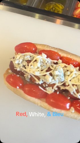 🧨Red, White & Bleu🧨 Celebrate the 4th of July with a bacon-wrapped dog topped with tomato, mayo and bleu cheese! #steamieween...