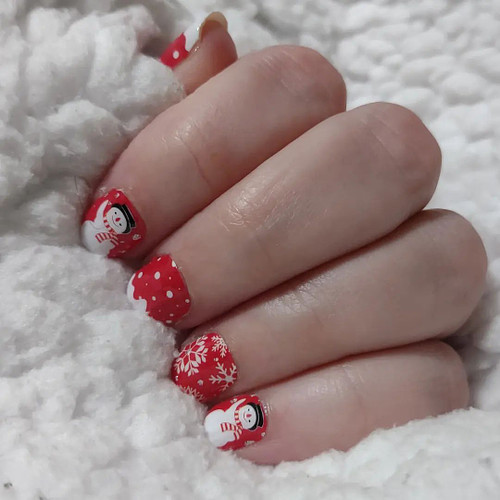 The latest set of wraps from #lilyandfoxnails. Christmas themed because I can. They're so cute!

#manicure #nailwraps #christ...