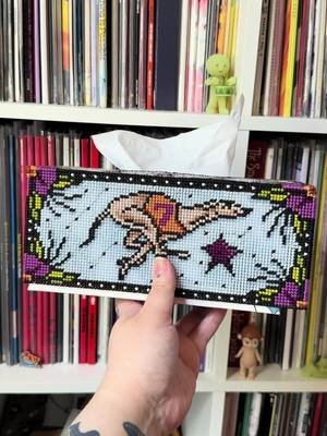 hello friends! i made another tissue box cover! this is about 4 hours of work condensed down to about a minute. i'm calling this one the lucky dog, with an adorable greyhound motif with a lucky number 7 racing bib and horseshoes. i experimented with elements that wrap around the corners, it was a bit of a challenge but im quite happy with how it turned out. you could definitely just do whip stitching in black instead of making it all complicated like i did. this pattern is live on my website if you're keen to make your own! thanks for lewkin'! 🏇 #crossstitch #needlepoint #diy #embroidery #greyhound 