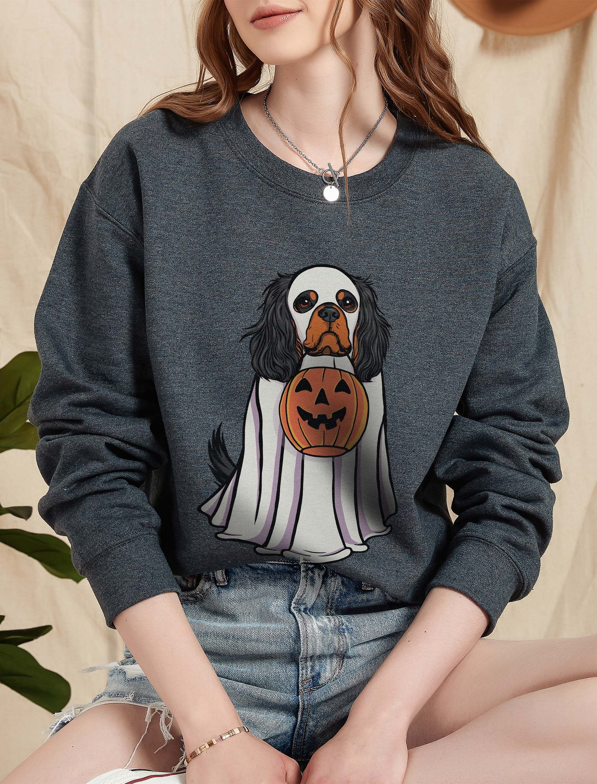 Funny Halloween Cavalier King Charles Spaniel(Black & Tan) Sweatshirt | Funny Cavalier Wearing a Ghost Costume and Holding a Pumpkin Basket product image (1)