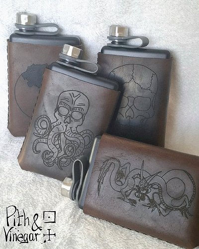 New batch of leather-wrapped flasks fresh out of the workshop.

Skulls, wolves, dragons, eldritch tentacles. Because whatever...