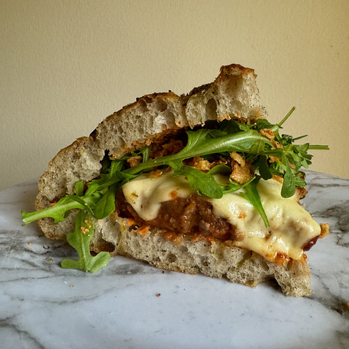 This week’s random sandwich is a MEATLOAF MELT. Beef and pork blend meatloaf with a sweet chili glaze, smoked romesco, pepper...