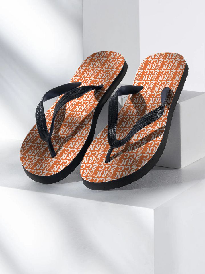 BOURNE to Flip Flop™ | Cape Cod Vibes for Your Soles | Mini BRN.2C.C. Logo Repeat Sandals | White Logo on Orange product image (1)