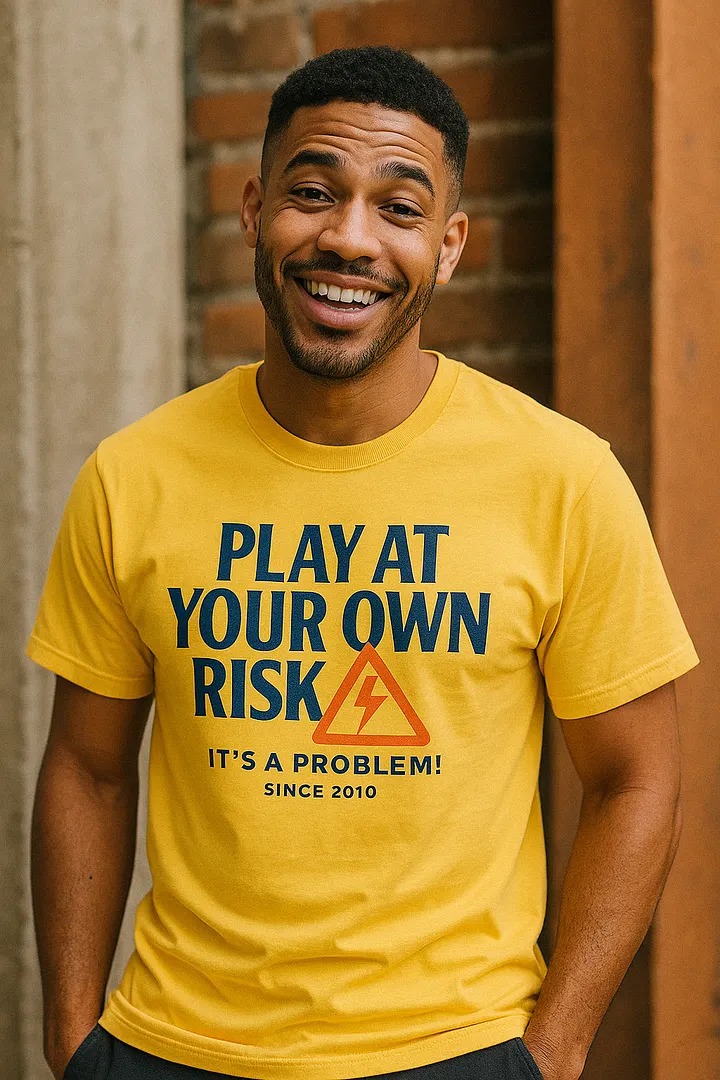 "PLAY AT YOUR OWN RISK" - Statement Graphic Tee product image (2)