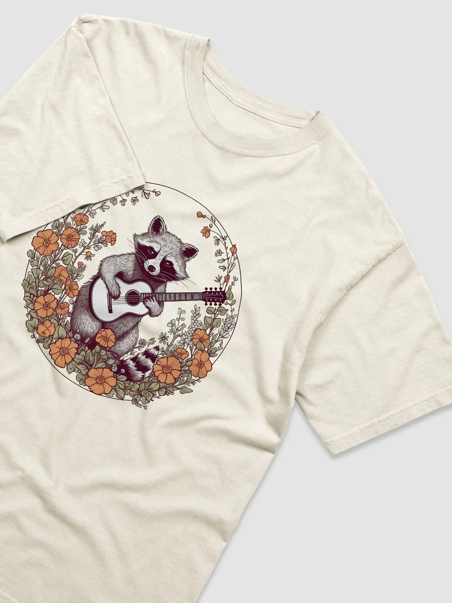 Vintage-Style Raccoon with a Guitar in a Field of Wildflowers and Daisies T-Shirt | Cottagecore & Goblincore Shirt Design product image (12)