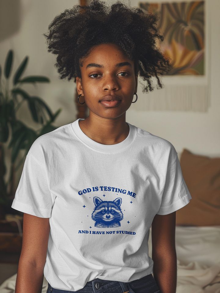 Funny Raccoon Meme T-Shirt - „God Is Testing Me And I Have Not Studied”, Vintage Style Shirt product image (1)
