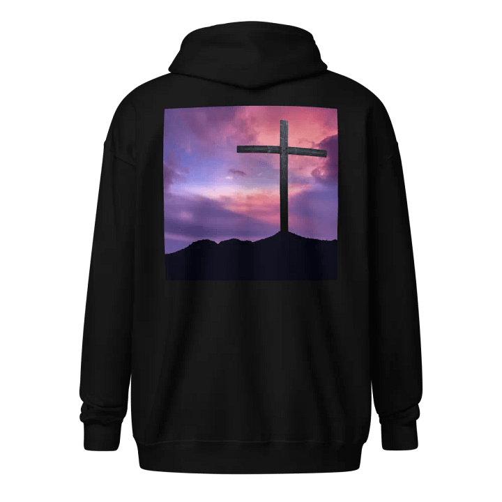 Wooden cross standing on a hill, silhouetted against a vibrant and colorful sky transitioning from deep purples to pinks Hoodie product image (1)