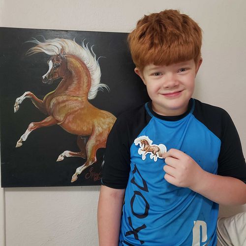 Benjamin is holding the flaxen chestnut stallion, now made into a sticker! Get yours! https://www.stickermule.com/staceymayer...