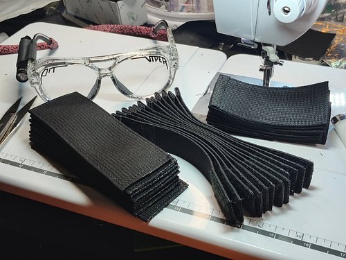 Almost entirely on one bobbin, it gave out 1/4 of the way on the last adjustment strap's 1