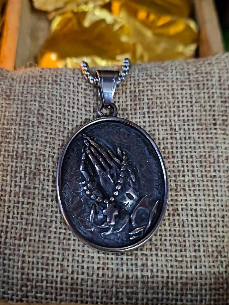 The Armored Kingdom: Hand of Grace Prayer Necklace product image (1)