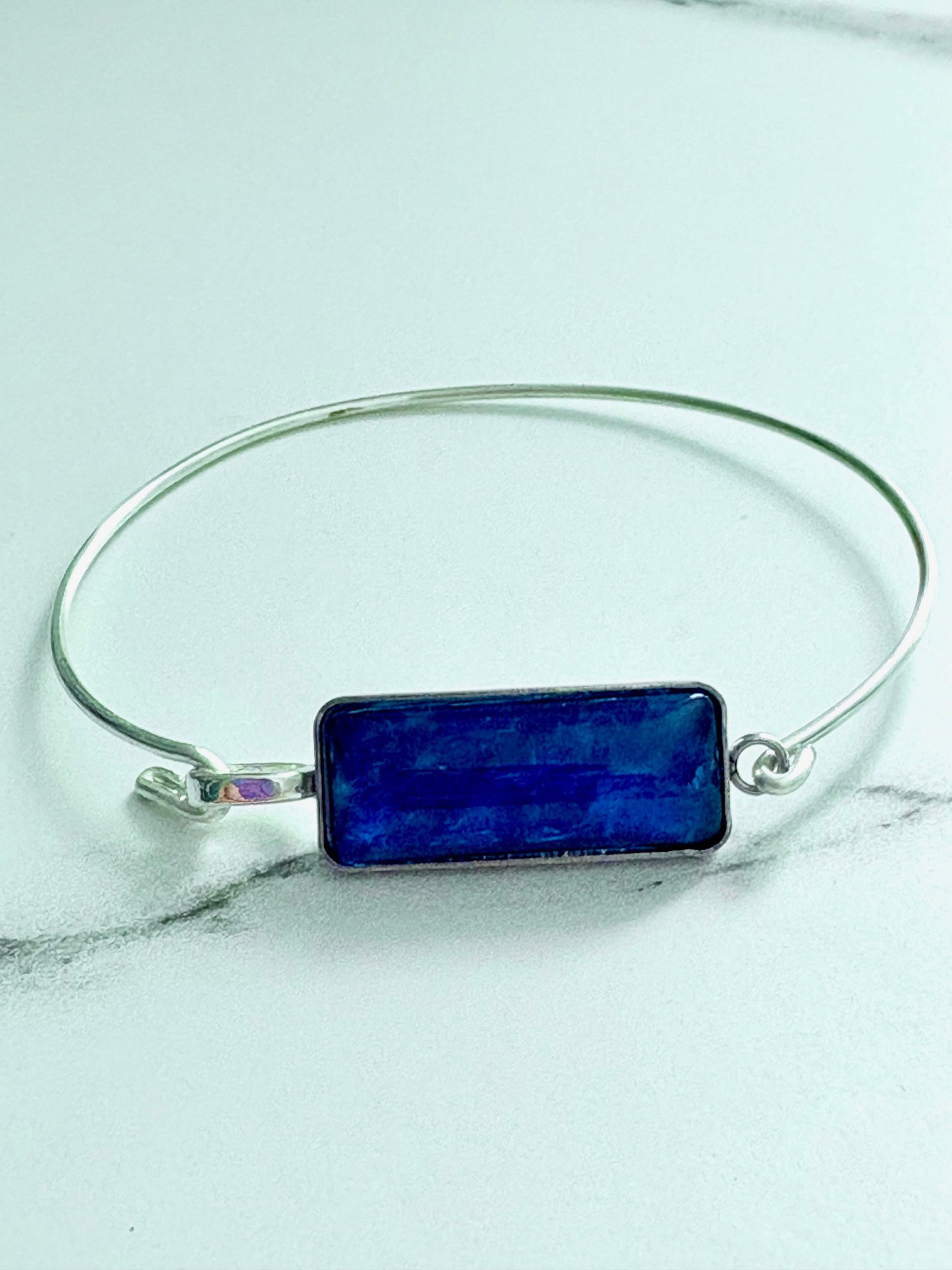 MFD-00177 | ⚡ Electric Tide Bangle | 6.75" Silver-Plated Wire Bracelet with Purply Blue Rectangle Charm | Handmade Coastal Charm Jewelry by Monique Faella Designs™ product image (1)