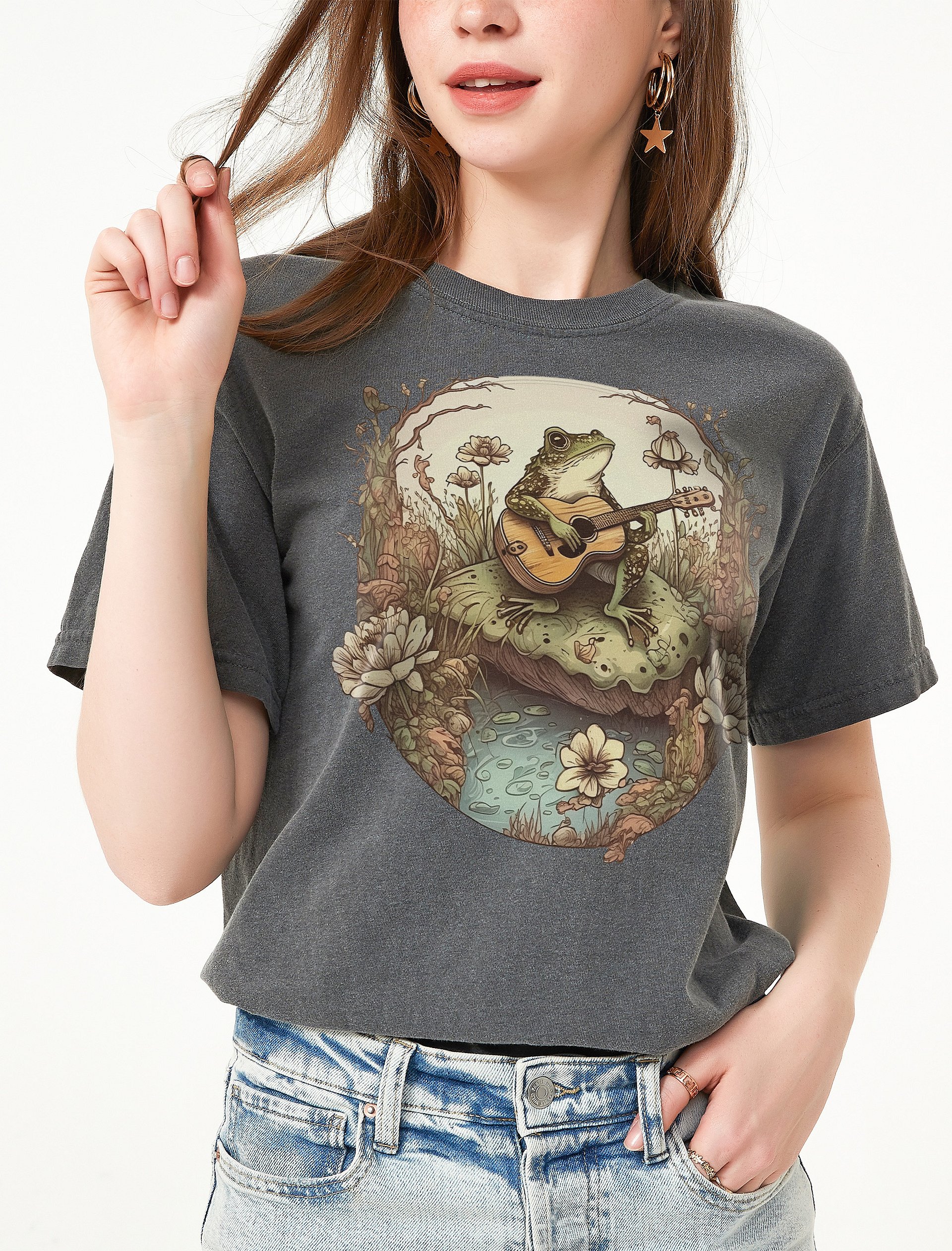 Vintage-Style Cottagecore Frog Playing Guitar in Forest T-Shirt | Cottagecore, Goblincore, & Mystical Shirt Design product image (20)