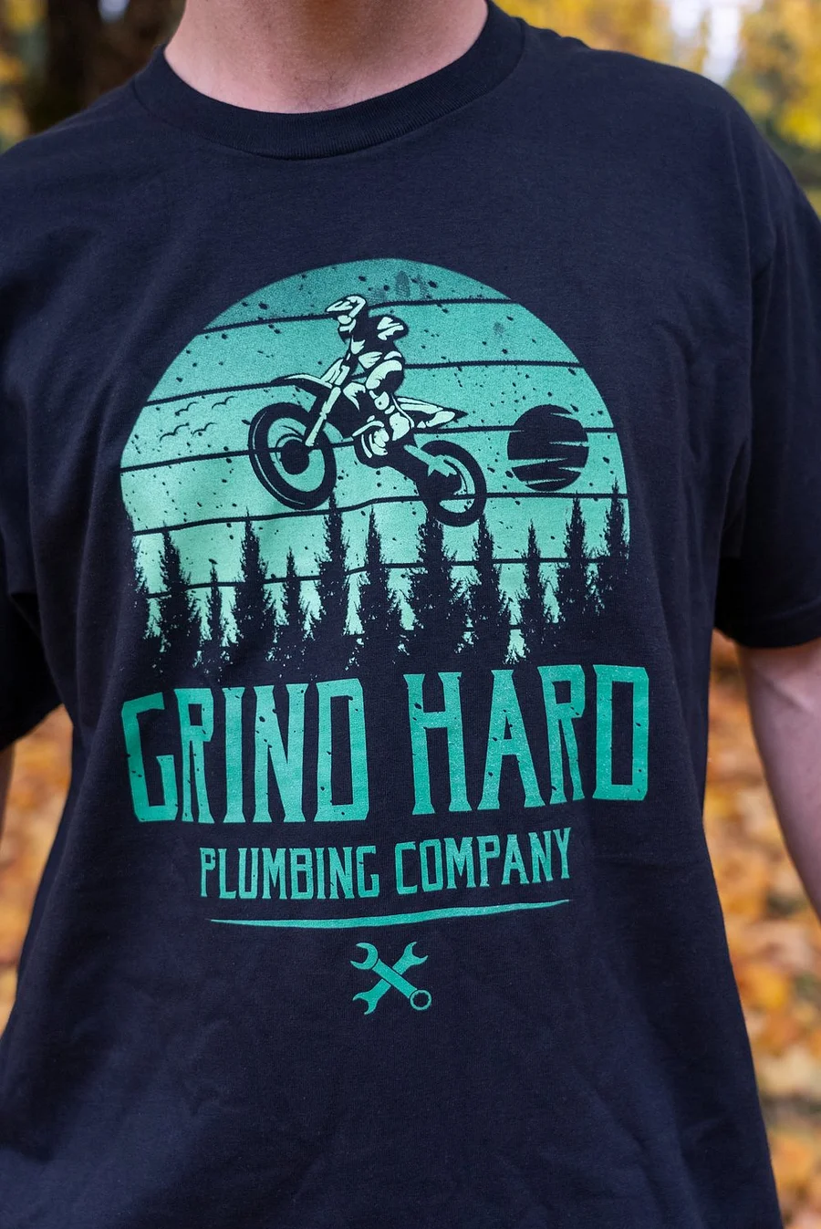 FLYING TEE Grind Hard Plumbing Co