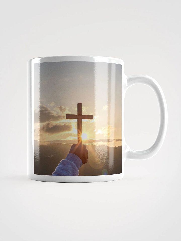 Cupped hands holding a glowing cross silhouette & Wooden cross being held up against the backdrop of a sunrise Mug product image (1)